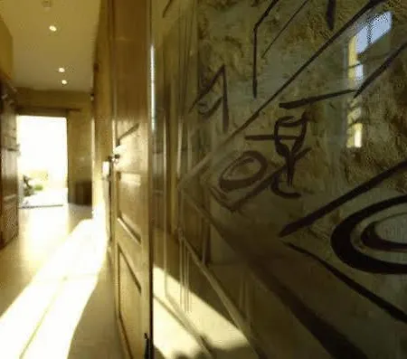 Szálloda L'empreinte Du Temps